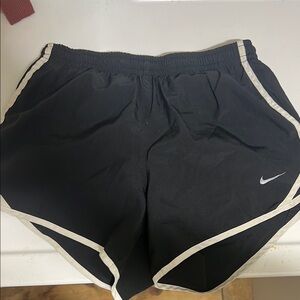 Nike Black/ White Running Shorts. Girls M. Hole/stretching in underlining.